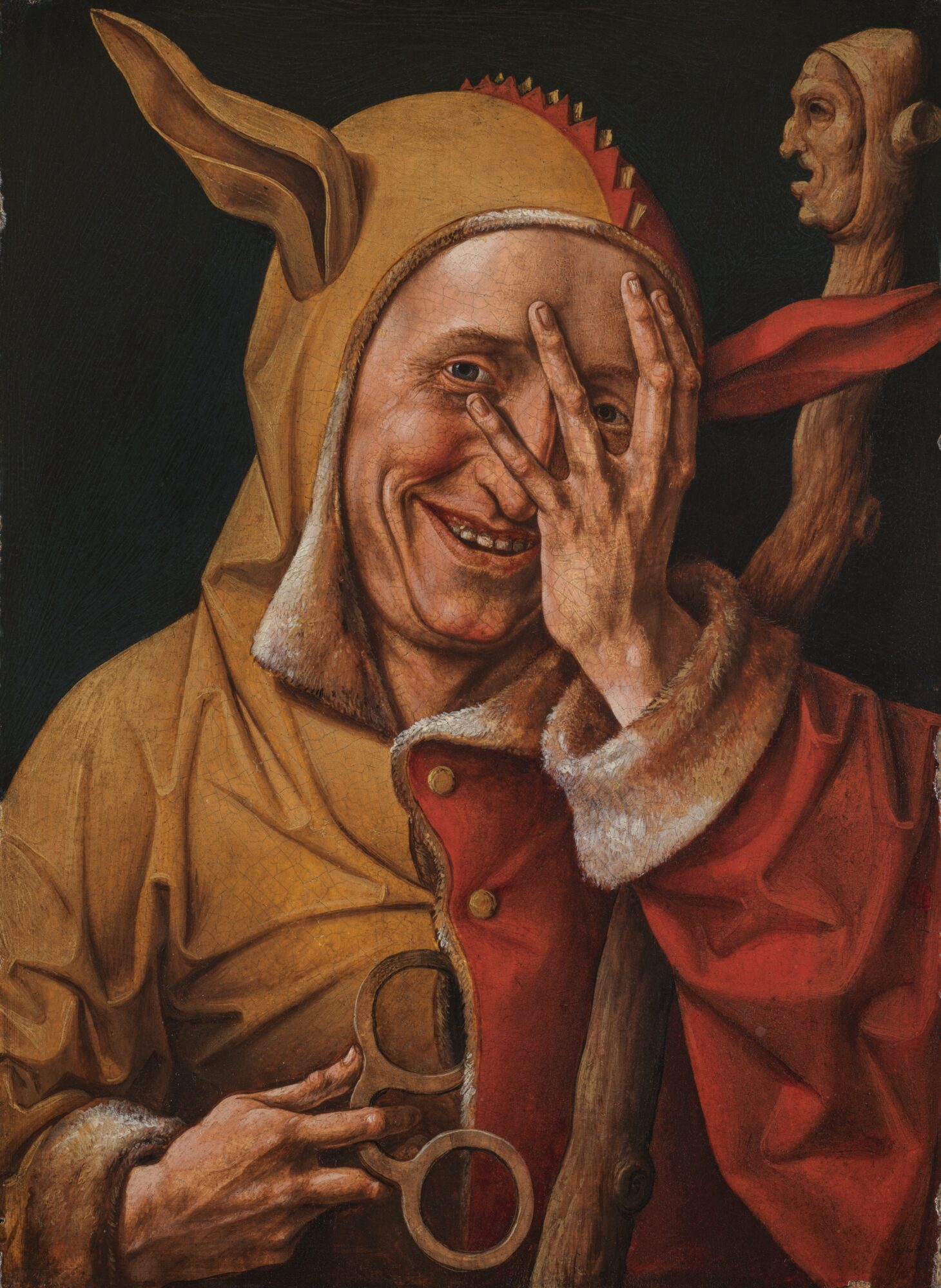Painting of a smiling figure in fool’s costume covering one eye with a hand, with a second figure in the background, by Frans Verbeeck, c. 1520.