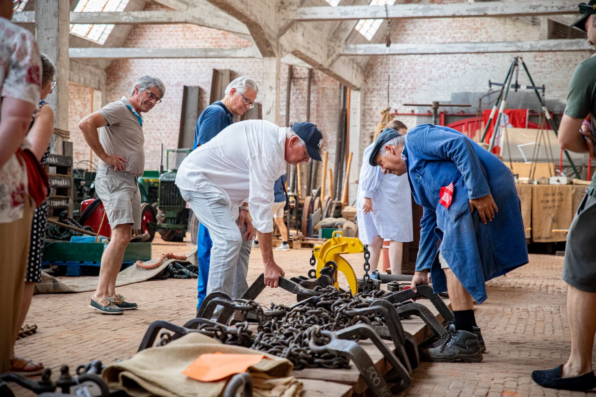 Visitors explore historic port tools and equipment at Den Argentin in Antwerp during Heritage Day Flanders.