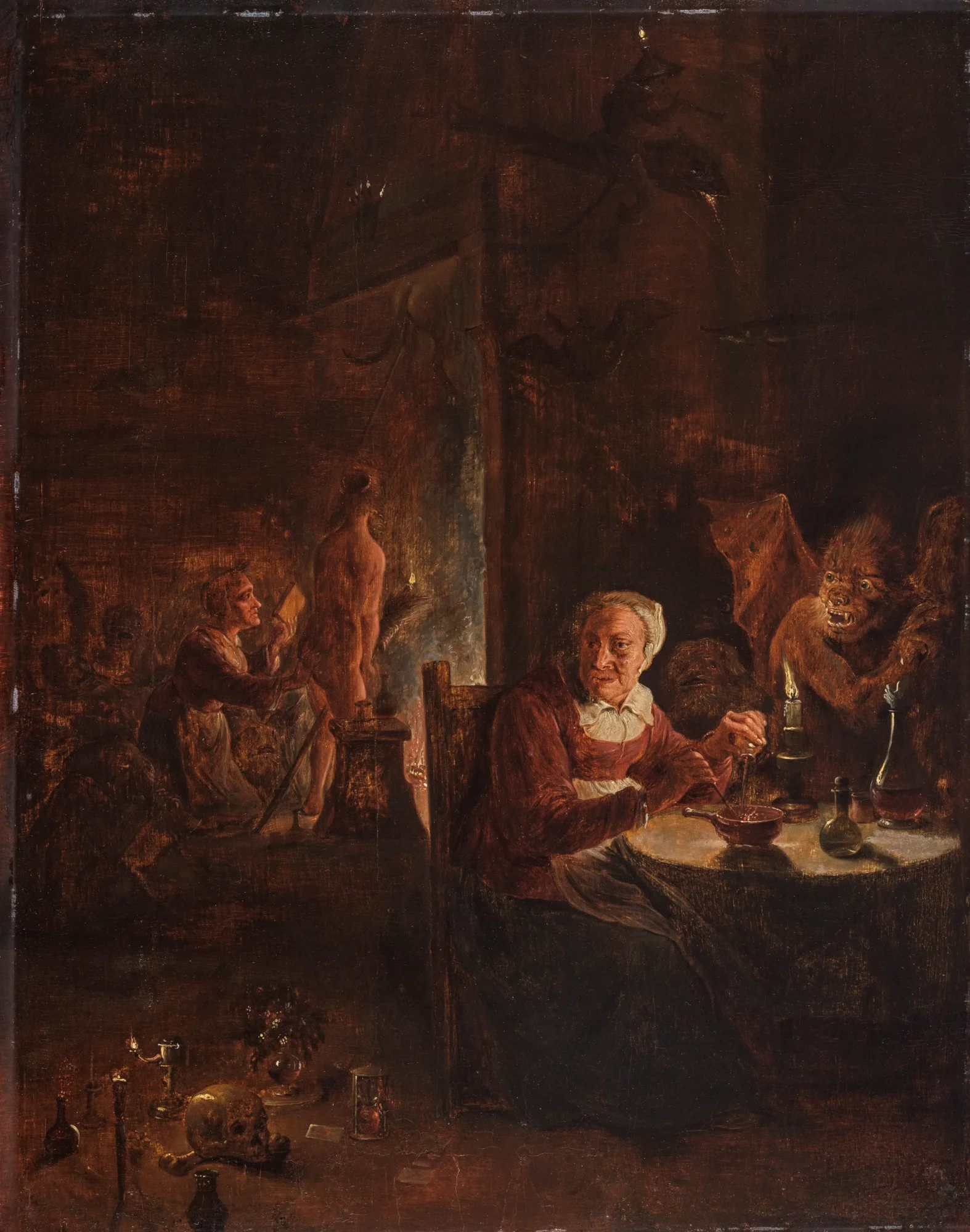 Schilderij van David Teniers II met een heks aan een tafel, omringd door flessen, magische voorwerpen en demonische figuren in een donker interieur.